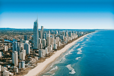 A long sandy coast with high-rises and skyscrapers. Original pub