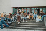 Students gathering on library steps