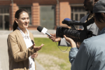 group-people-taking-interview-outdoors