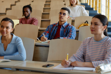 Group of students studying together at university