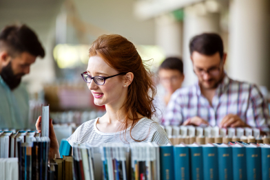 happy-young-university-students-studying-with-books-library-group-multiracial-people-colleg (1)