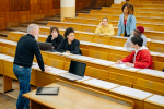 people-sitting-chair-front-table-stock-photo