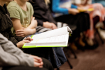 selective-focus-shot-person-holding-book (1) (1)