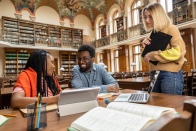 Students work in university library and looking involved