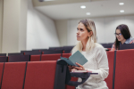 woman-with-tablet-listening-lecture