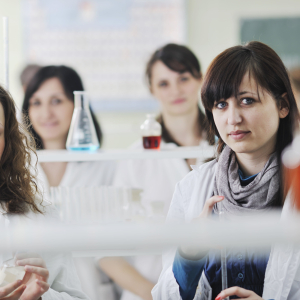 young-woman-students-group-bright-chemistry-lab